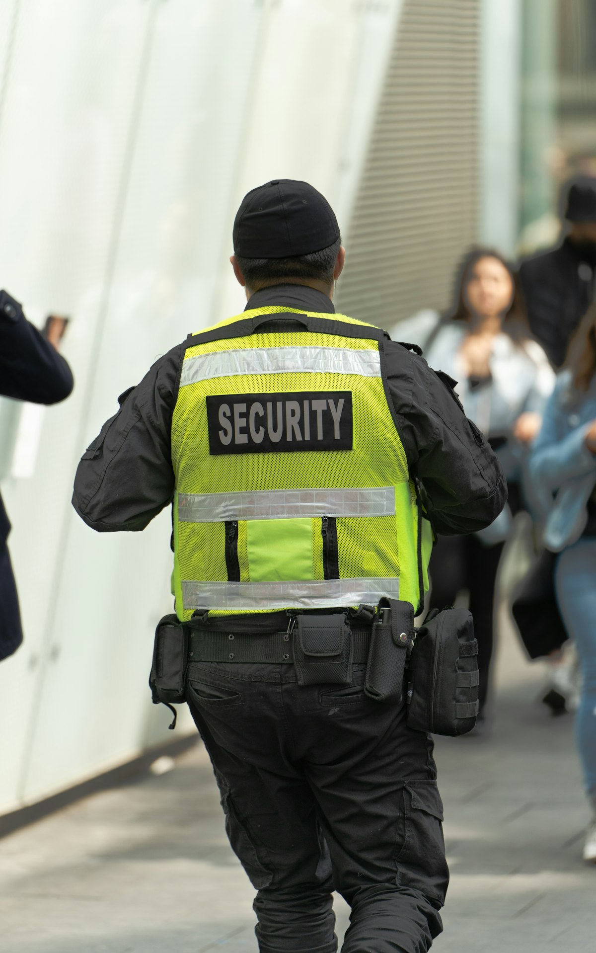 Security guard in hi-vis on duty
